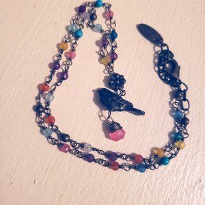 Plunder necklace with bird